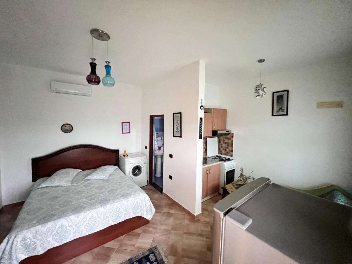 Ponari Apartments Rrotull Bagian luar foto